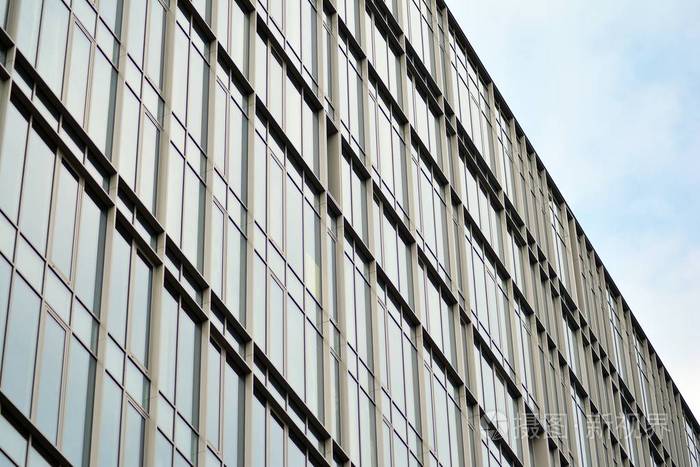 当代建筑的抽象片段, 由玻璃和混凝土构成的墙壁.