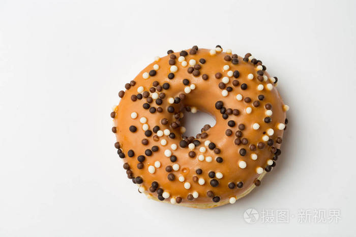 一个甜甜圈位于光的背景最小