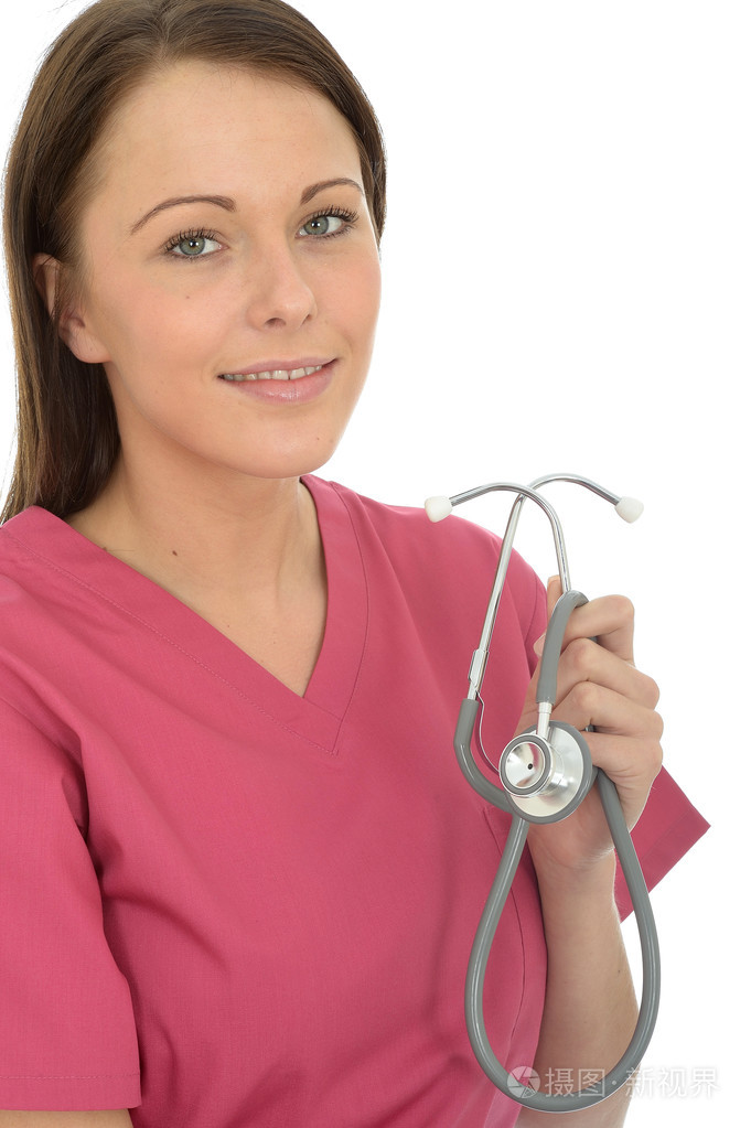拿着相机的镜头她听诊器的漂亮年轻的女医生