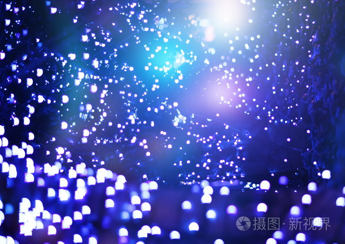 与自然景和明亮的金色灯光的节日背景老式魔术背景颜色