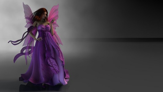 魔法仙女在粉红色的连衣裙照片