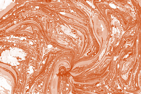 橙色大理石背景与油漆飞溅纹理
