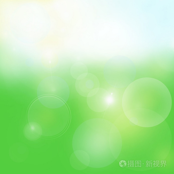 春天的明亮的绿色背景与泡沫和发光