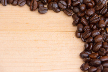 咖啡豆质地放置在褐色背景上