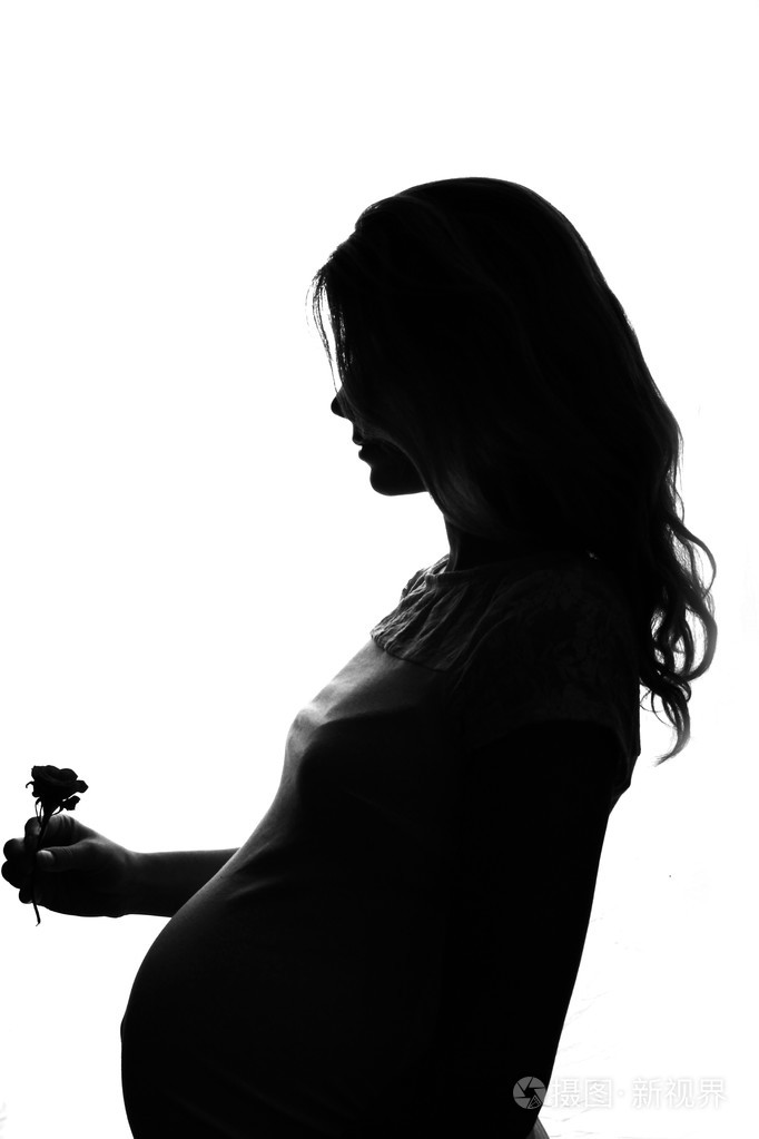 怀孕的女人的剪影照片-正版商用图片0bkykh-摄图新视界