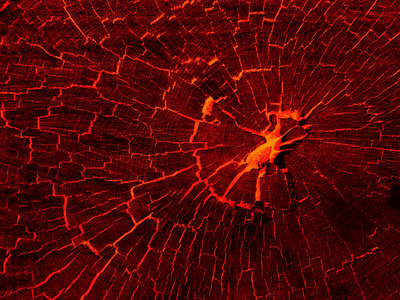 纹理的熔岩裂缝地面泥浆凝固热熔岩纹理烈火煤熔岩纹理岩浆或熔岩.