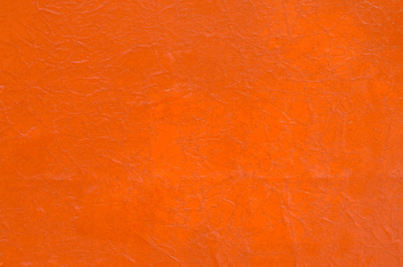 橙色的湿的纸背景纹理