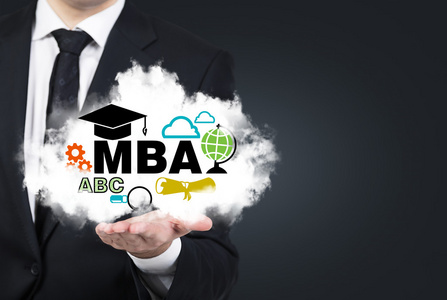 一个学生手捧着云与教育的图标。概念的 Mba 工商管理硕士学位