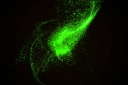 由绿色发光粒子的抽象背景