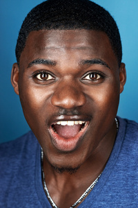 愚蠢的面孔滑稽面孔非洲人照片