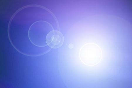 蓝色背景与镜头光晕照片