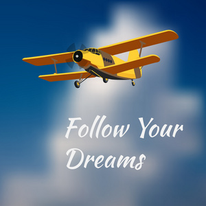 动机卡追随你的梦想，与老式飞机和模糊的天空背景图片