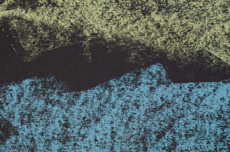 黑色蜡笔在黑色背景上的蜡笔画照片