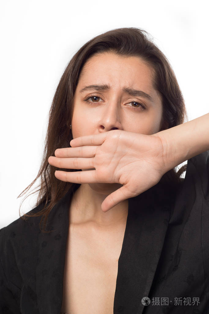 女商人打着哈欠覆盖她的手用她的嘴