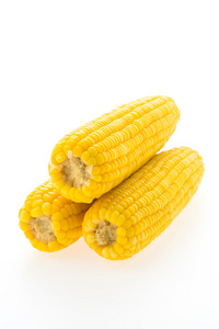 三个黄色的玉米棒子照片