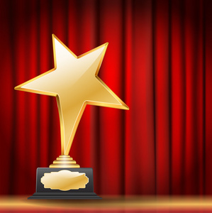 金色幕布红色幕布背景上的金色之星奖照片