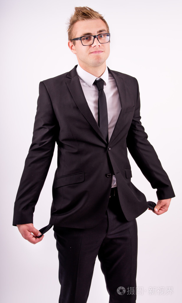 穿西装的商人显示空口袋