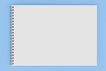 空白与金属螺旋装订在蓝色背景上的白色笔记本