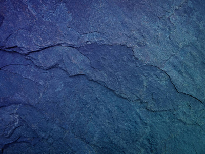 蓝花岗岩板岩的深蓝色背景照片