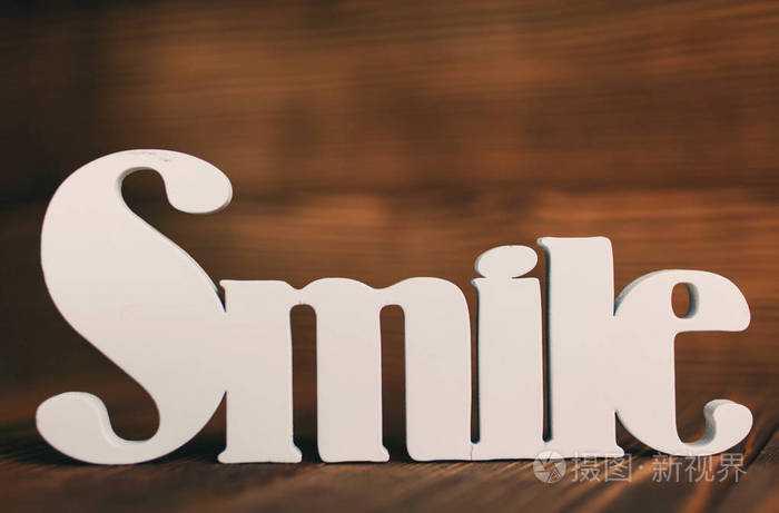 词 微笑和动机的概念 微笑木制背景上的文字照片 正版商用图片0cu6nw 摄图新视界