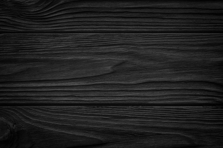 用光镜和划痕，暗黑色木制抽象背景