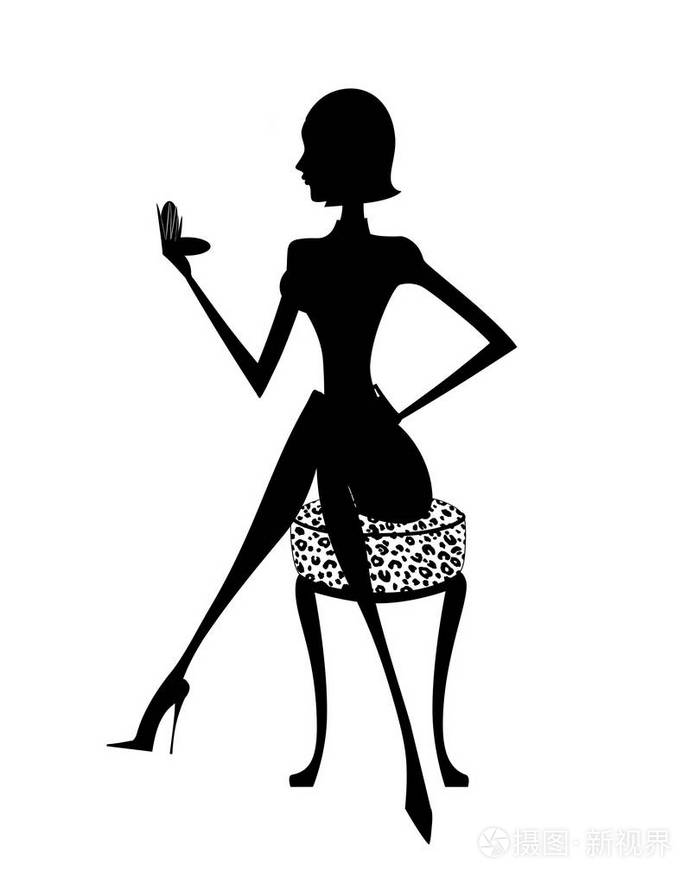 检查她的化妆的女人的剪影