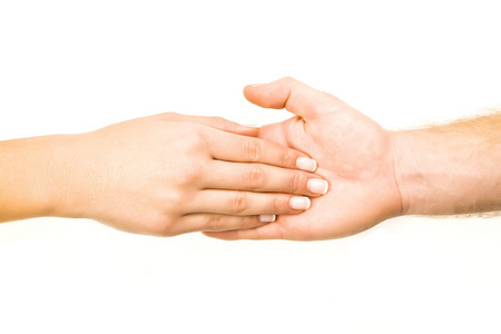 男性和女性的手紧握着白色背景图片