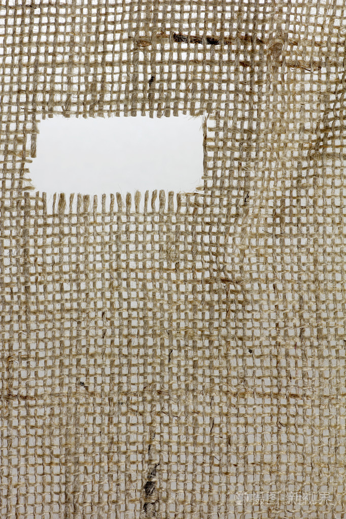 质地的麻布麻布以边缘磨损