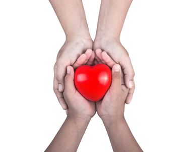 爱的概念: 女人抱着年幼的孩子的手和支持红色照片