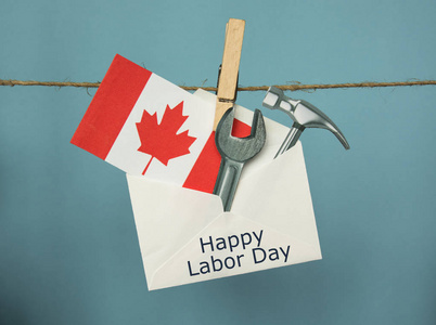 劳动节边框加拿大快乐的劳动节贺卡加拿大, 纸板锤, 扳手.