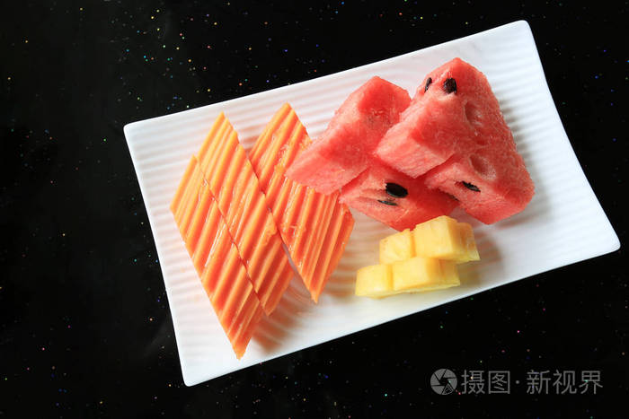 木瓜菠萝西瓜白碟食品桌