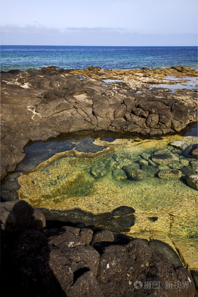 西班牙麝香池塘岩石石水兰萨罗特岛照片-正版商用图片