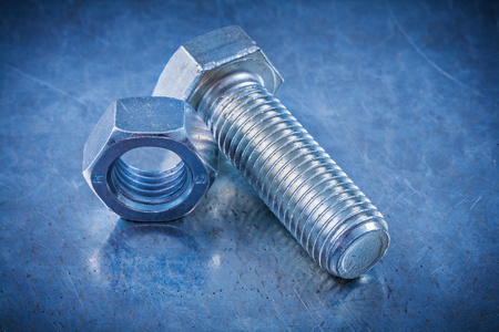 建设螺母螺纹的 screwbolt 和建设螺母照片