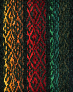 手工编织织物在黄色 红色和绿色