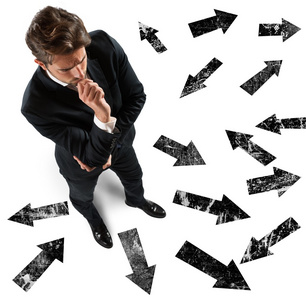 方向指标商人在方向犹疑不决照片