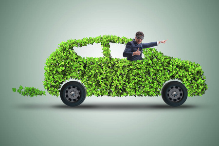 绿色的电动汽车概念的商人