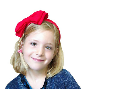 一个小女孩，在他头上的红色蝴蝶结的肖像