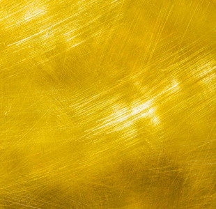 闪亮的拉丝金金属背景照片