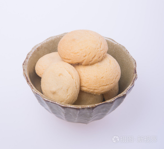 在背景上的黄油 cookie 或者