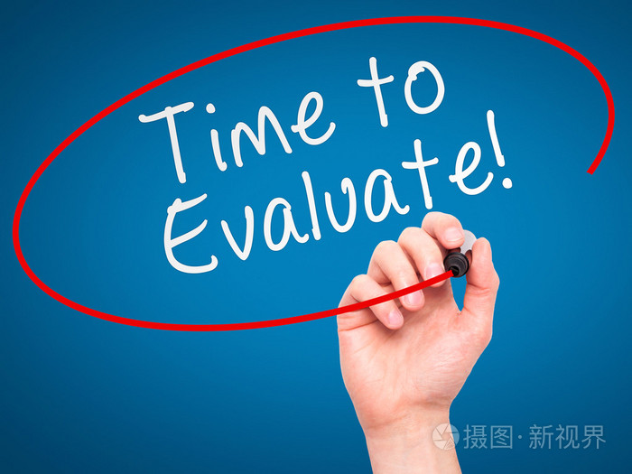 man hand writing time to evaluate with marker on transparent wip