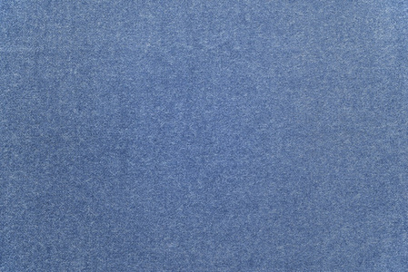 从面料的淡蓝色斑点带纹理的单色背景照片