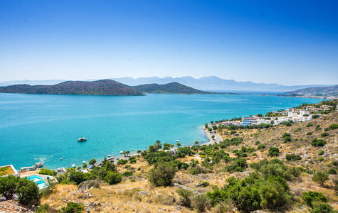 伊罗达，克里特岛，Greece.Paradice 视图的克里特岛与蓝色水镇的全景视图。伊罗达性质的全景视图