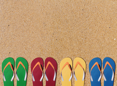 人的生活方式四放松拖鞋橙色砂背景