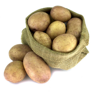 踢毽子的白色背景上的土豆