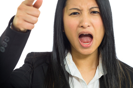 愤怒的亚洲业务的女人图片
