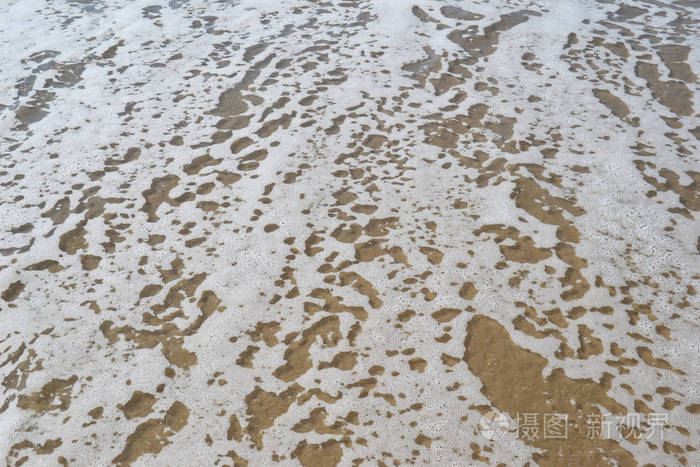 在沙滩上的海泡沫