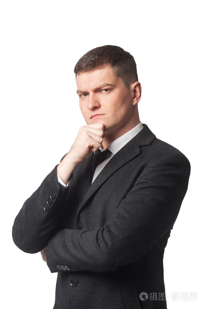 用手托住下巴西装的商人