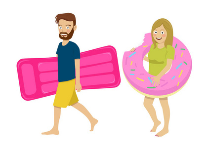 年轻夫妻散步充气床垫和洒甜甜圈浮球