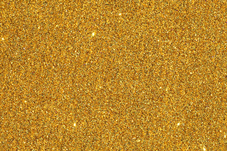背景生动明亮的金色闪光照片
