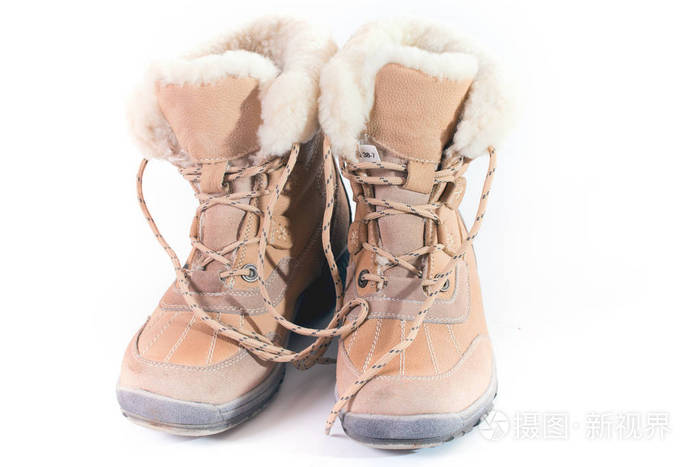 温暖的冬天从皮肤 麂皮和毛皮靴子
